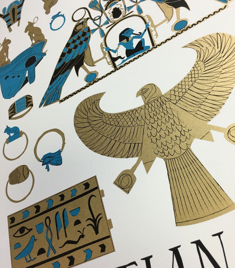 Close up of Art print Egyptian Jewels in black text with gold turquoise black imagery