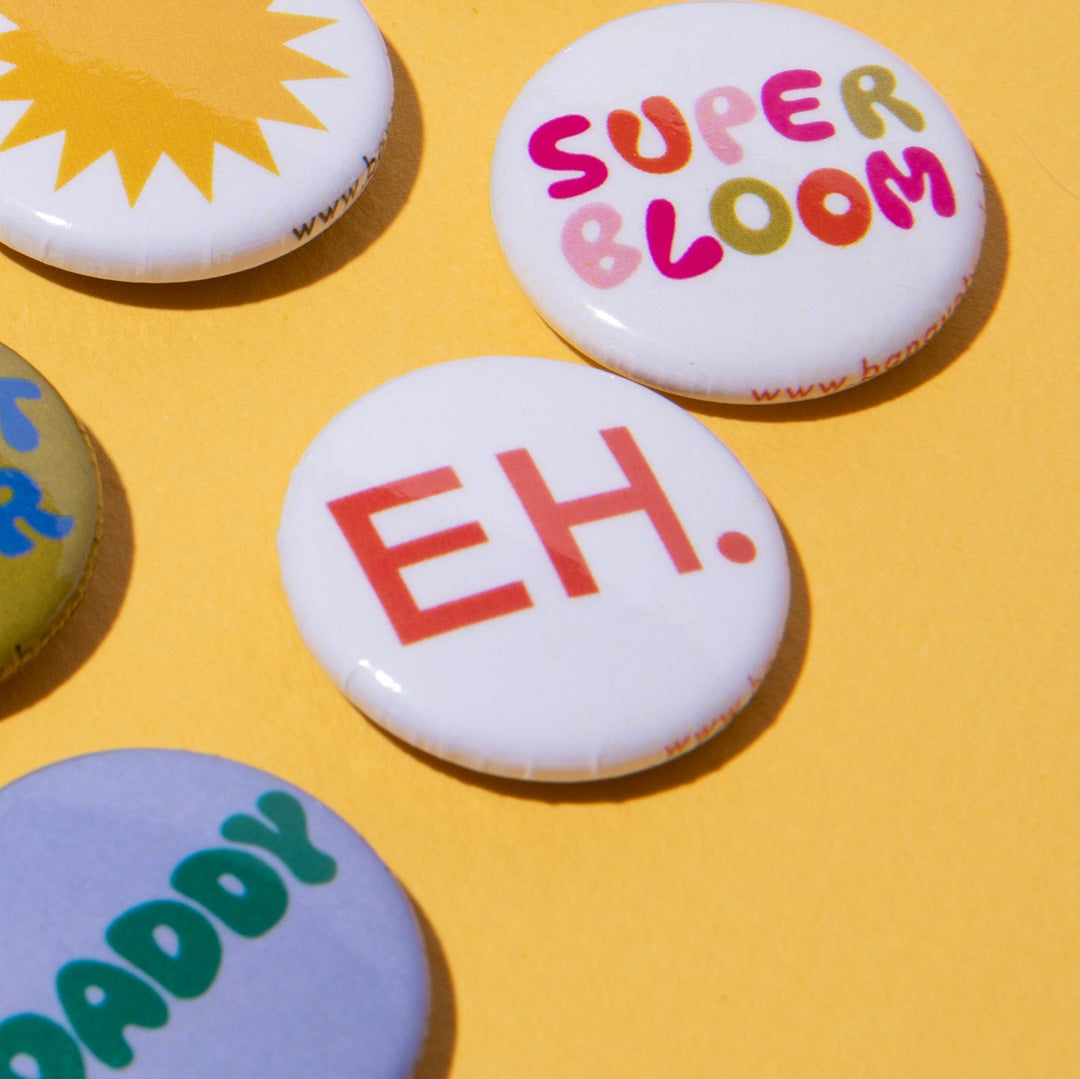 Eh. 1" Button