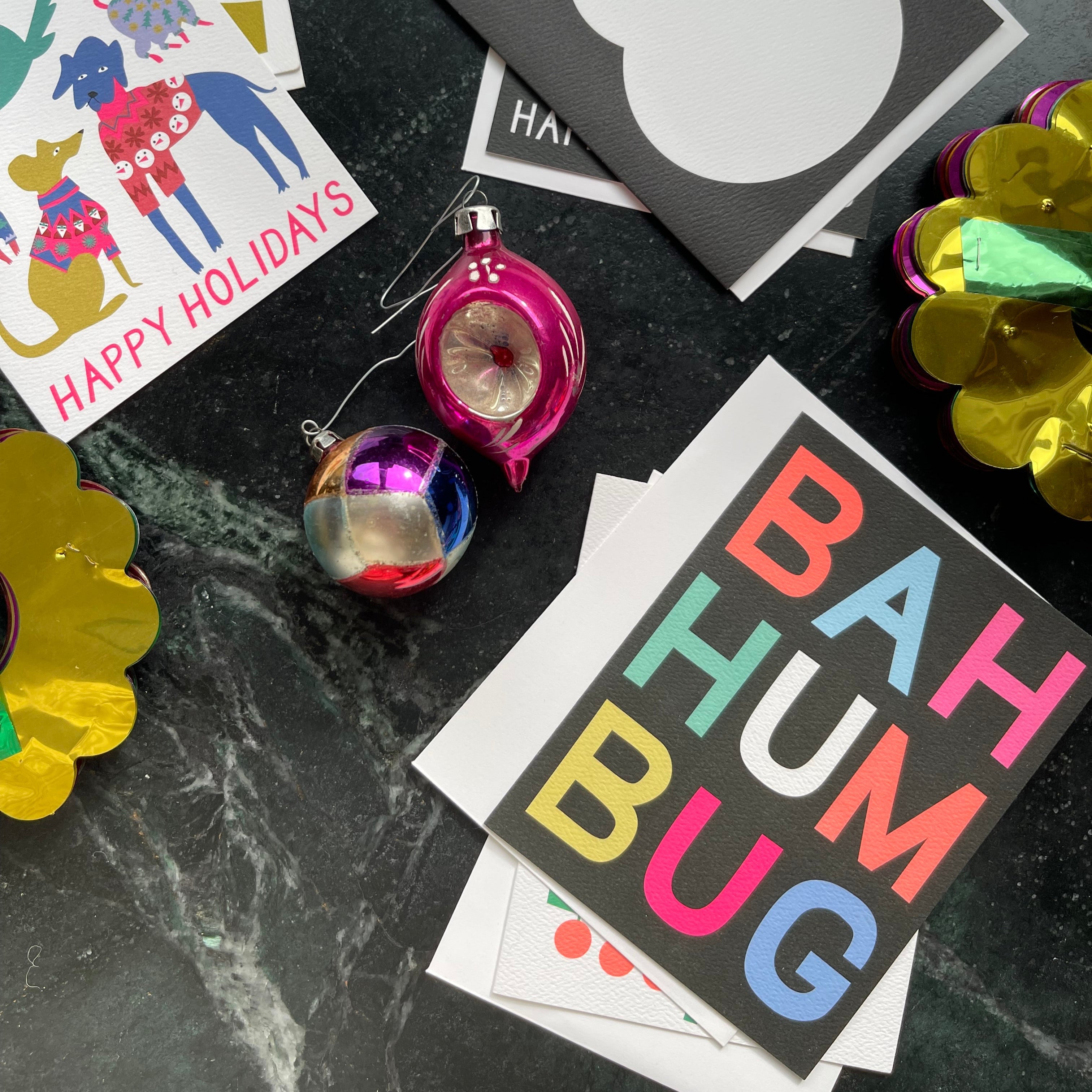 Holiday card with Bah Humbug in bold and colourful lettering