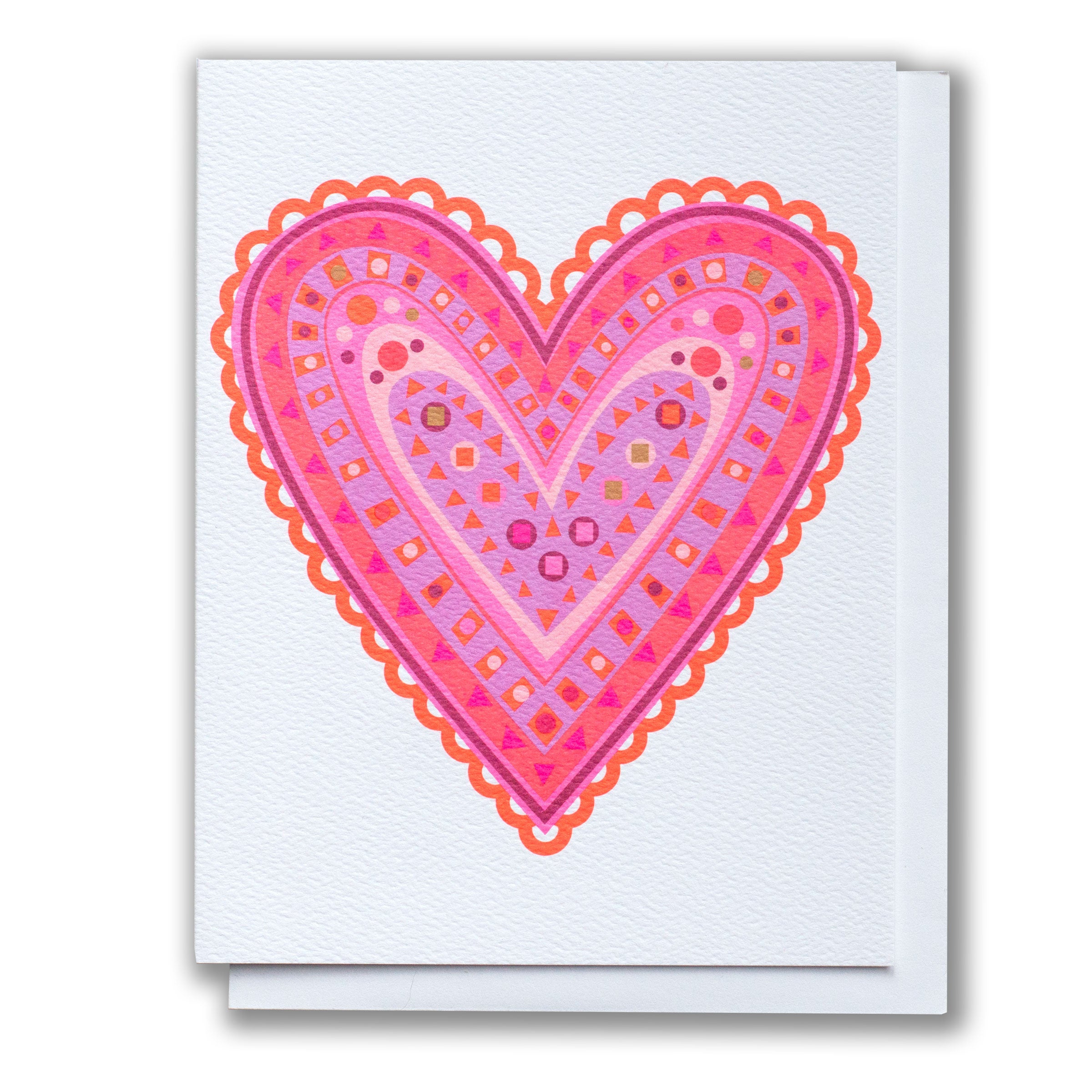 Greeting card with a pink and red heart with geometric shapes on a white background