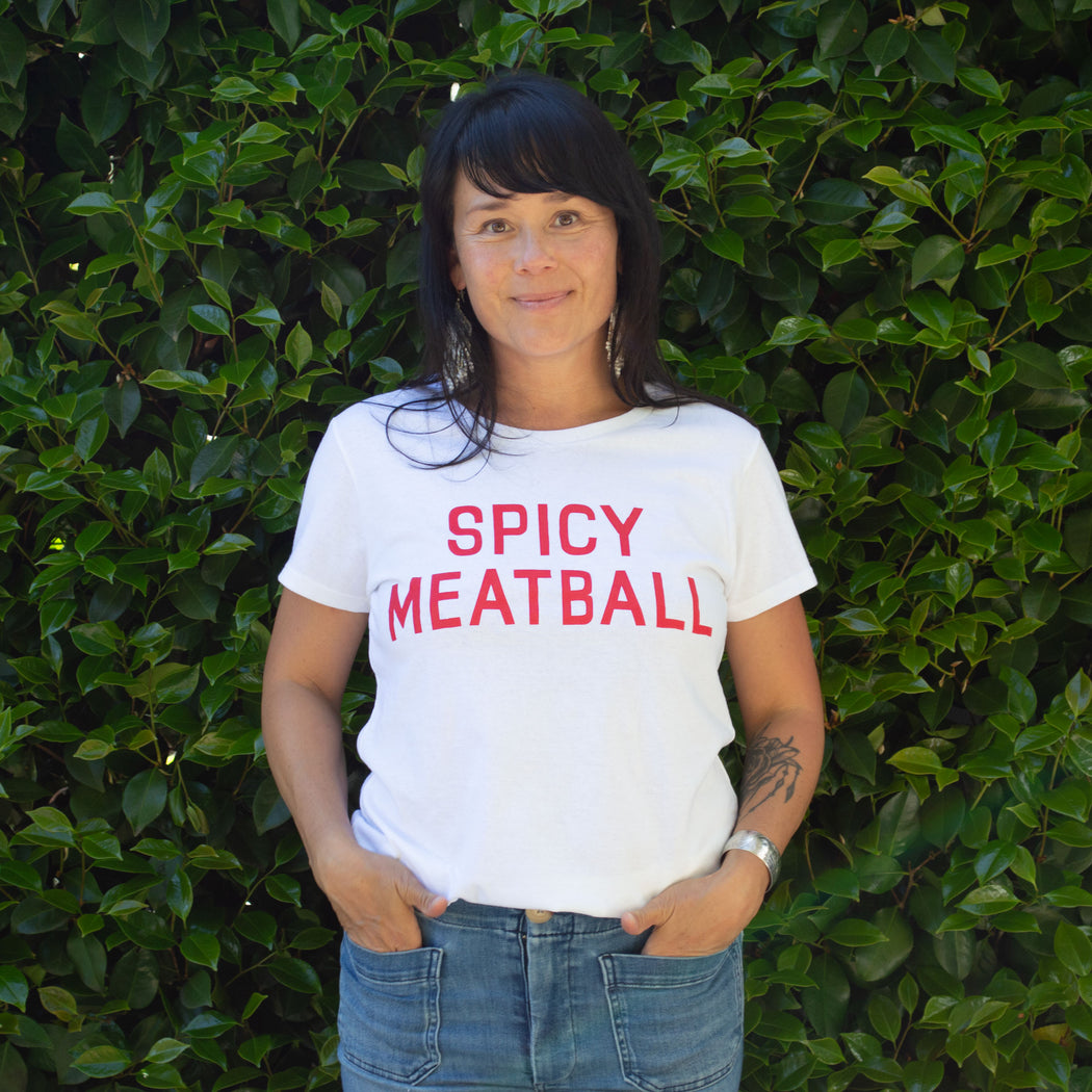 cute white t-shirt reads Spicy Meatball in graphic and classic red type