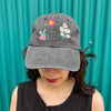 grey black baseball cap with a smattering of embroidered flowers