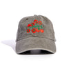 Olive green cap with red and green embroidered design 
