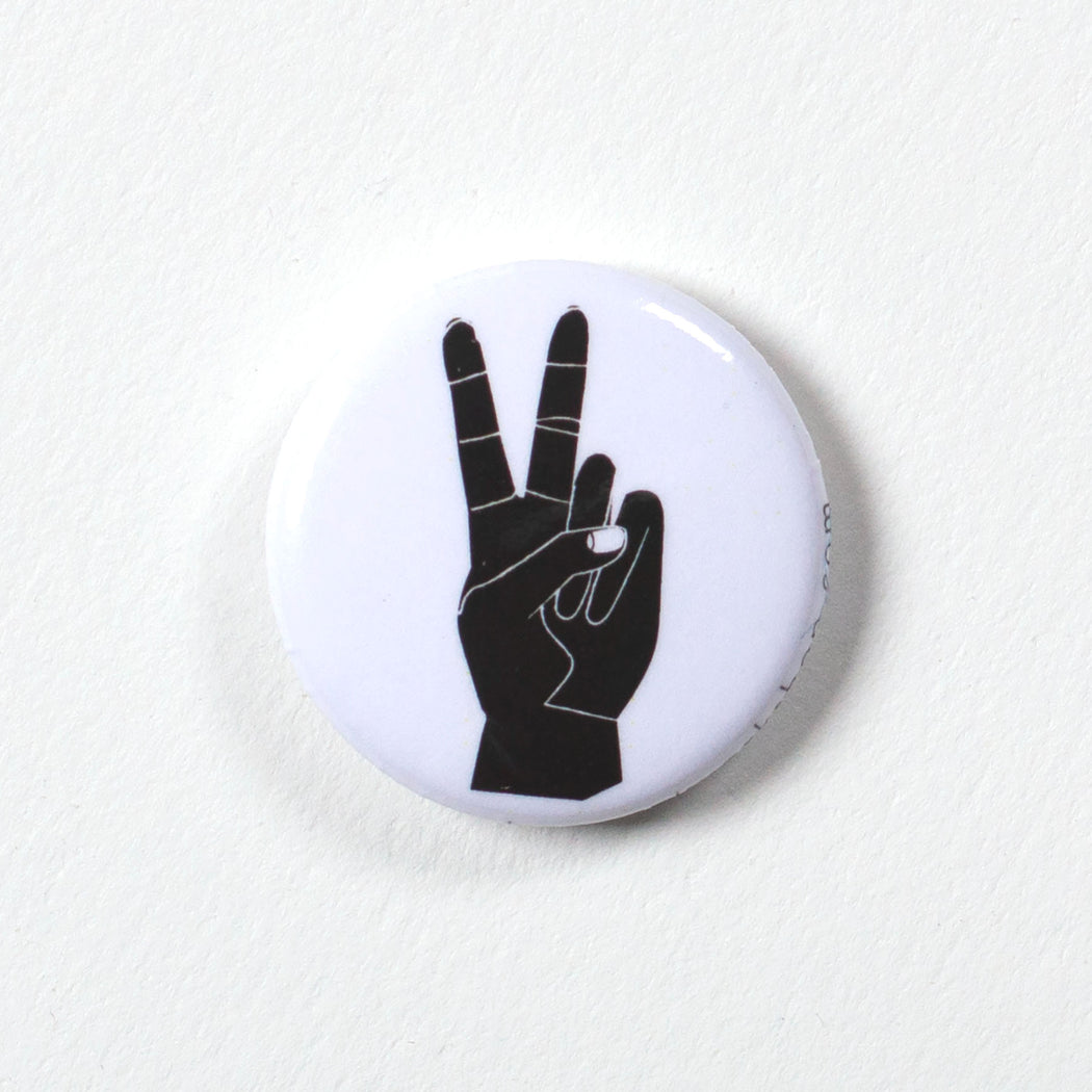 button with a hand making a two-fingered peace sign