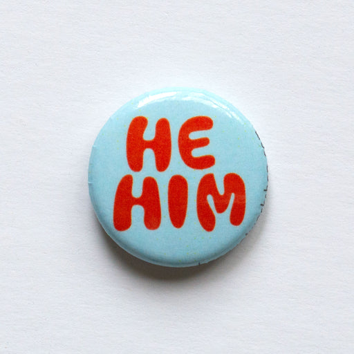 red and turquoise he him 1 inch button 