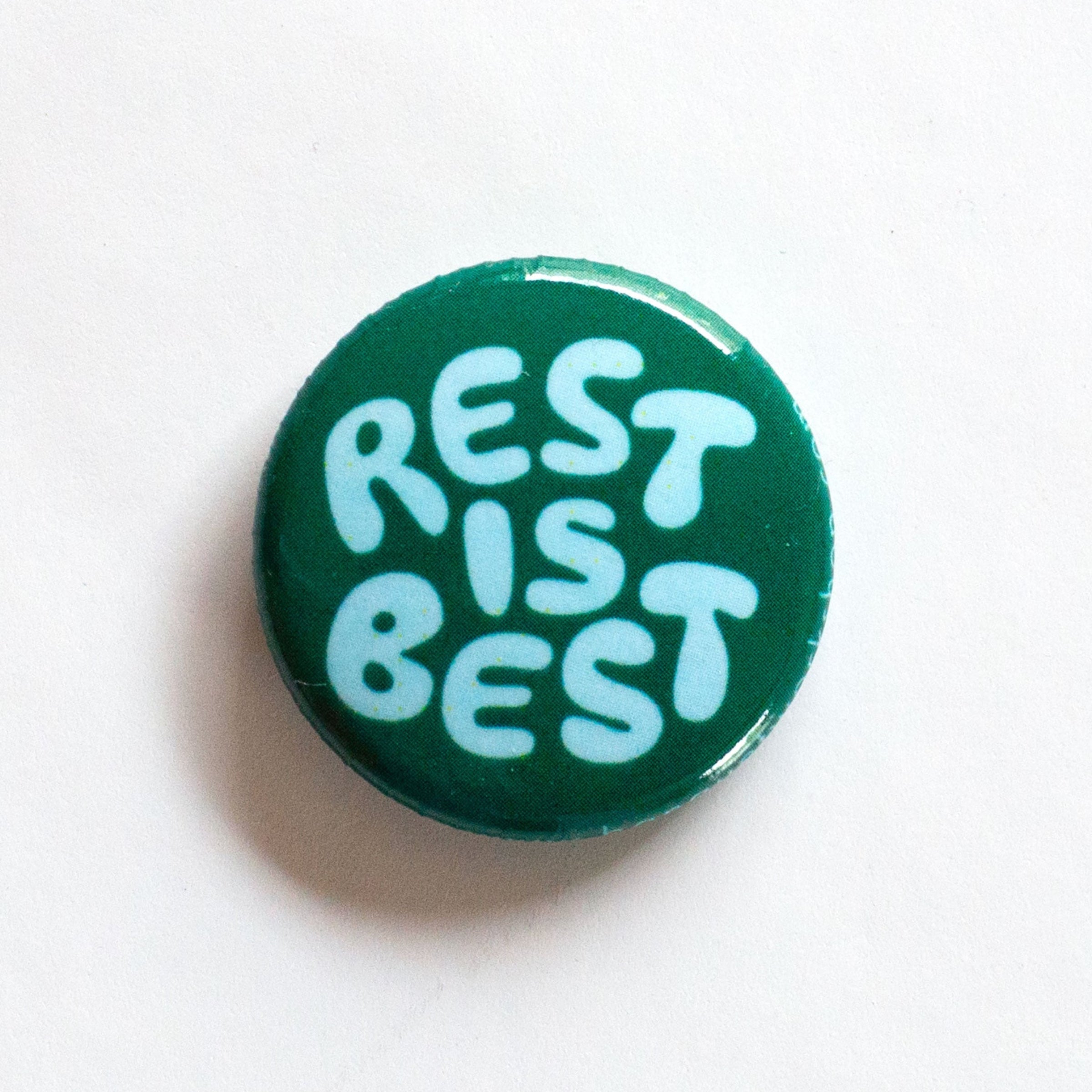 1" button reads "Rest is Best" in teal and turquoise lettering