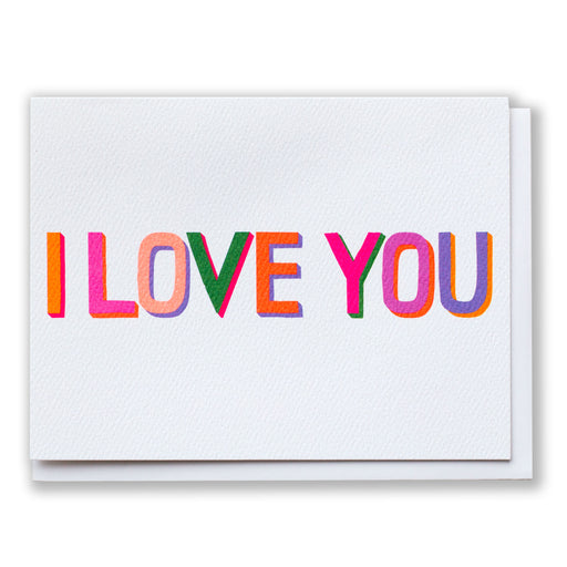 i love you in a rainbow of colours and a blocky vintage inspired typeface, all on a white background