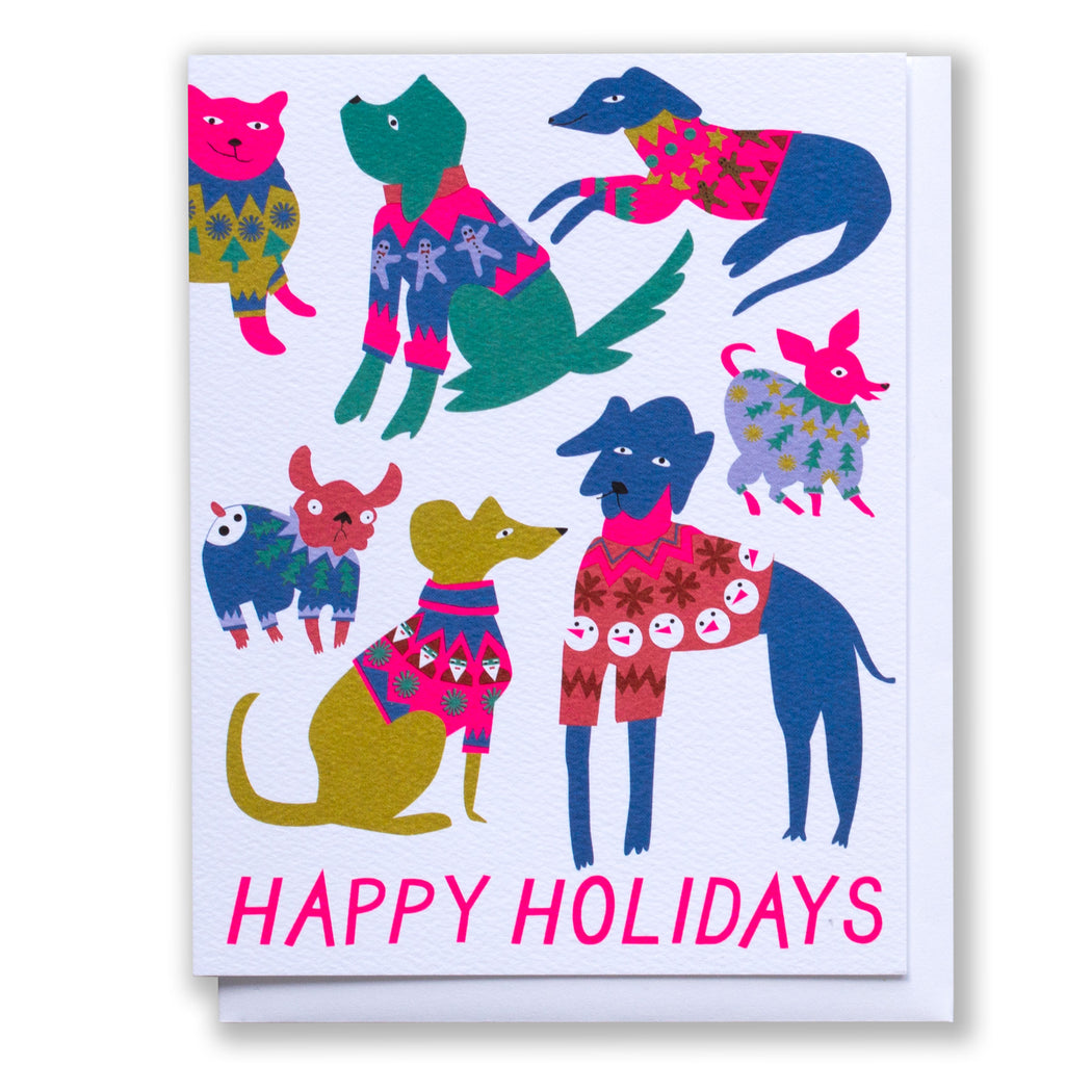 Holiday Christmas card adorable dogs in multicoloured cheery Christmas sweaters funny humorous with Happy Holidays text at bottom