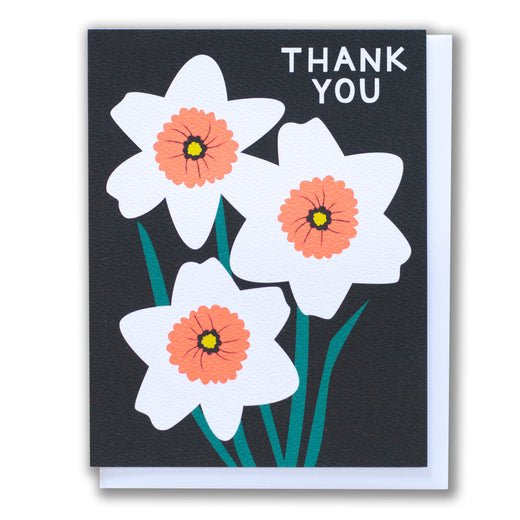 Great graphic narcissus flowers on a black background make for a bold thank you card.