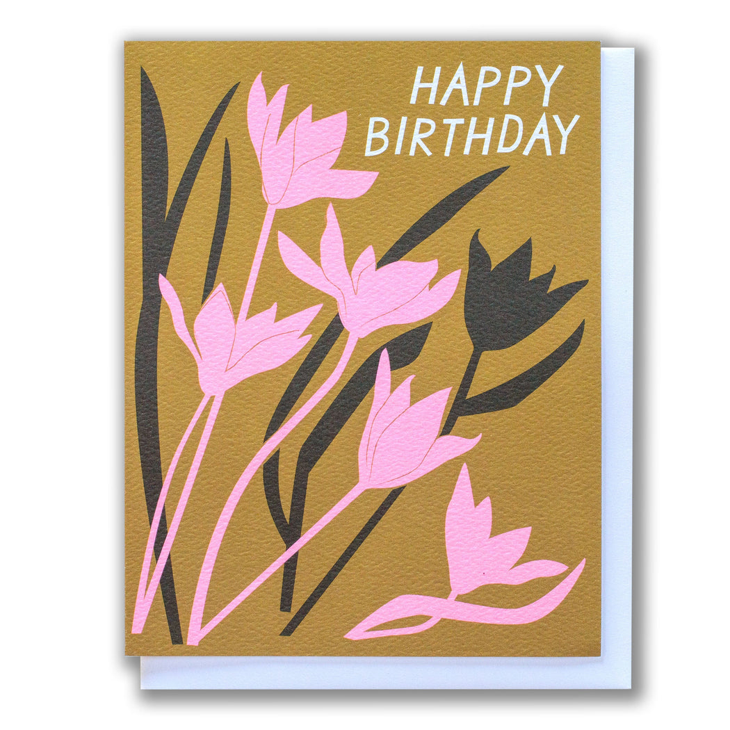 caramel brown and pastel neon pink woodblock-inpsired tulips on a birthday card