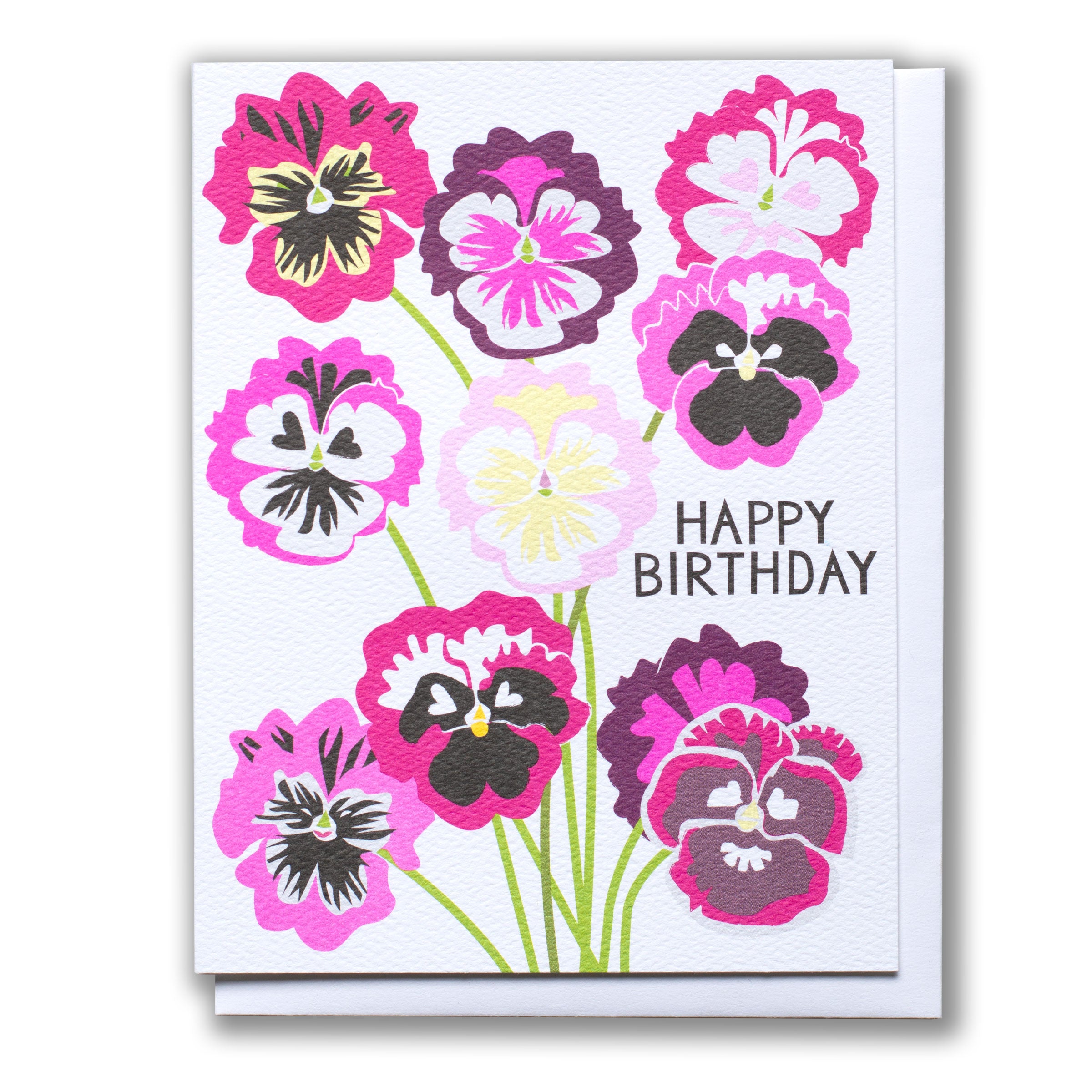 sweet pansy-flower-faces in purples and pinks on a birthday card