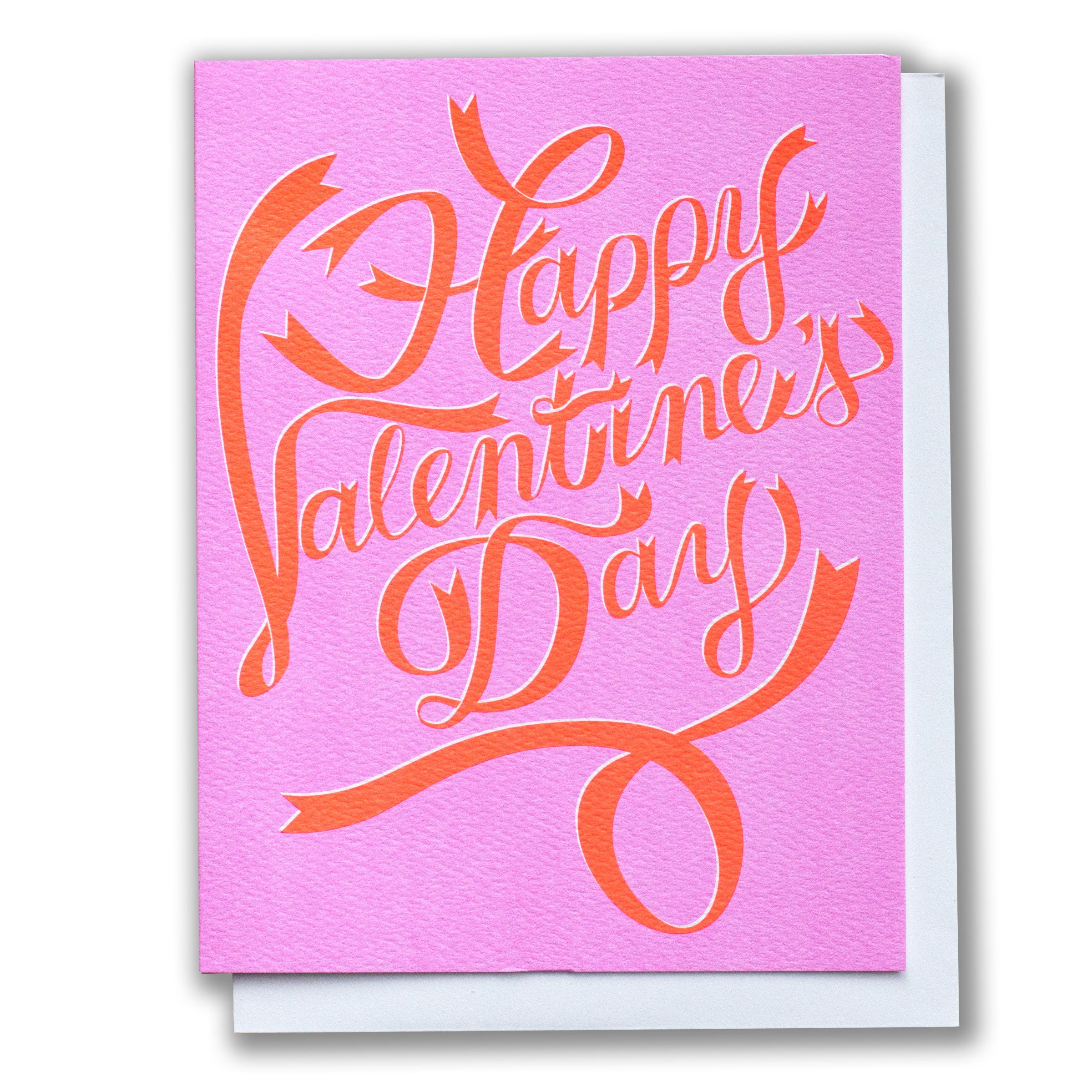 Valentine's Day card with 'Happy Valentine's Day' in neon ribbon on a pink background