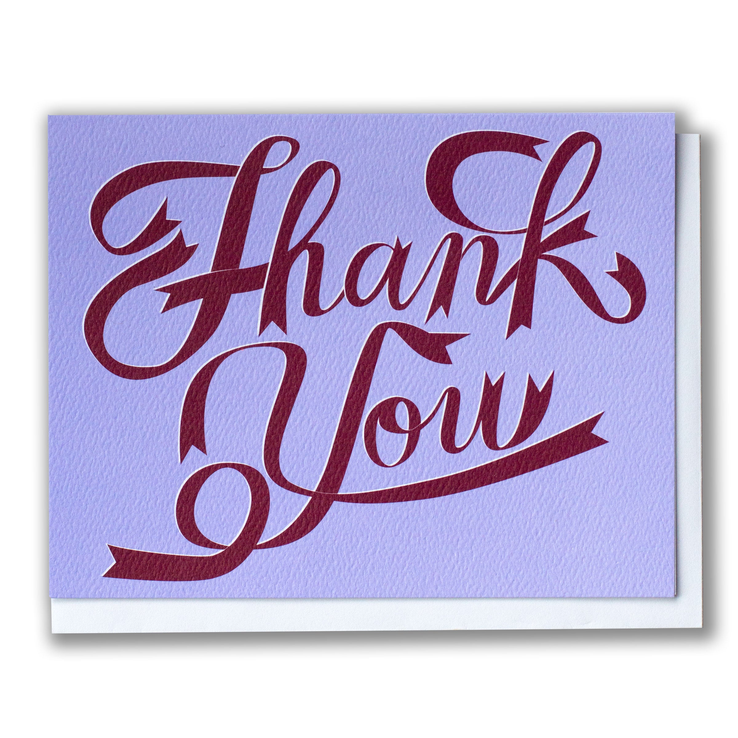 Card with 'Thank You' in burgundy ribbon text on a lilac background