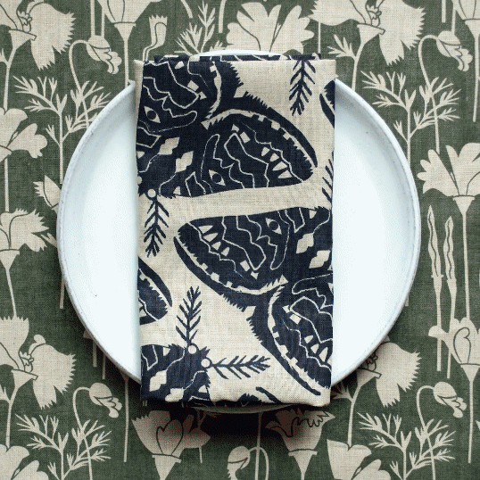 slideshow of new napkins and tea towels styled with a hand made plate