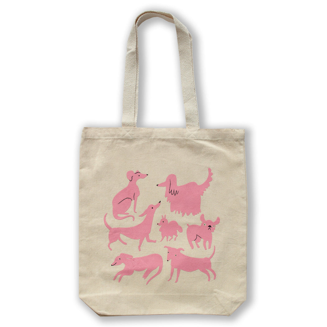 Canvas tote bag screenprinted with pink dogs of different breeds