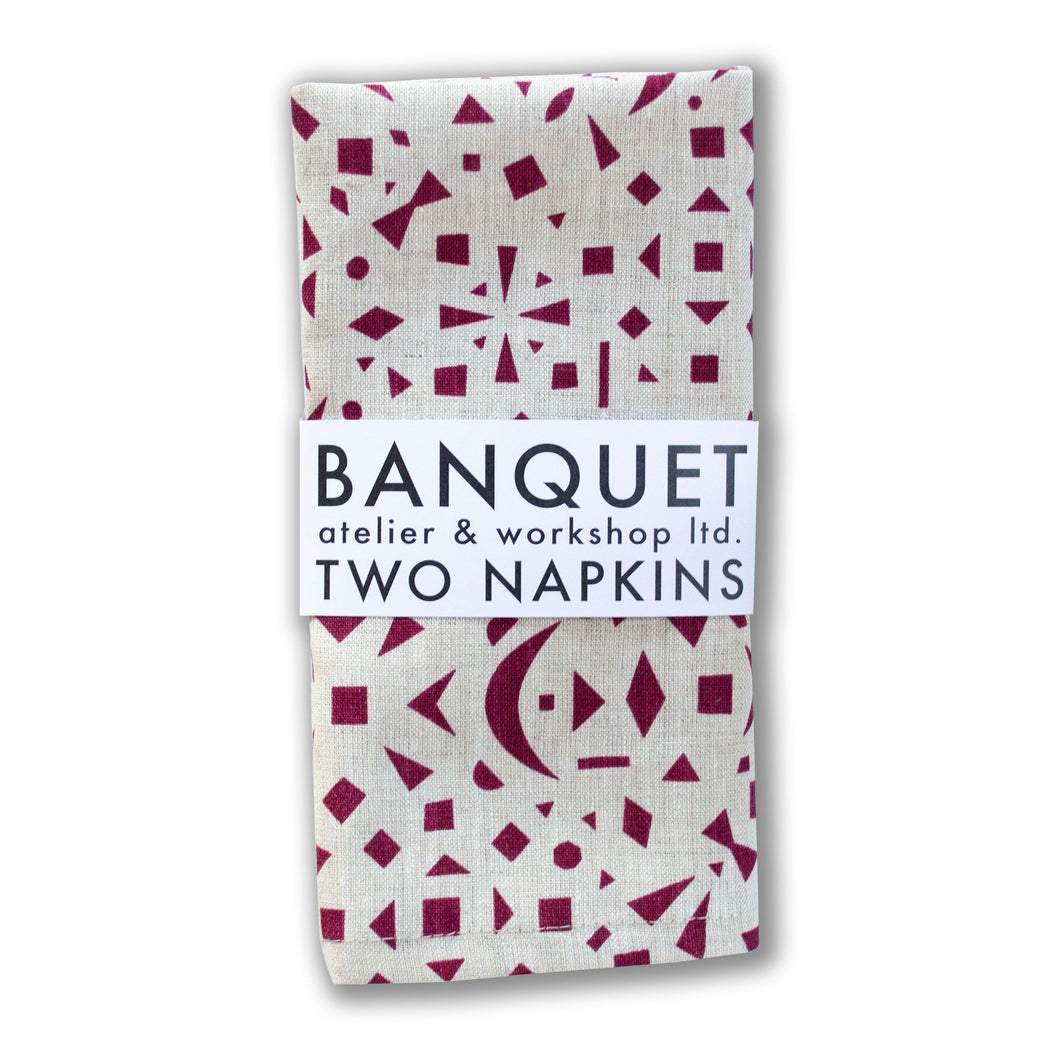 100% linen napkins screen printed with tiny burgundy red geometric shapes