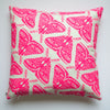 beautiful almost hand sized neon pink moth repeat print in a pillow cover