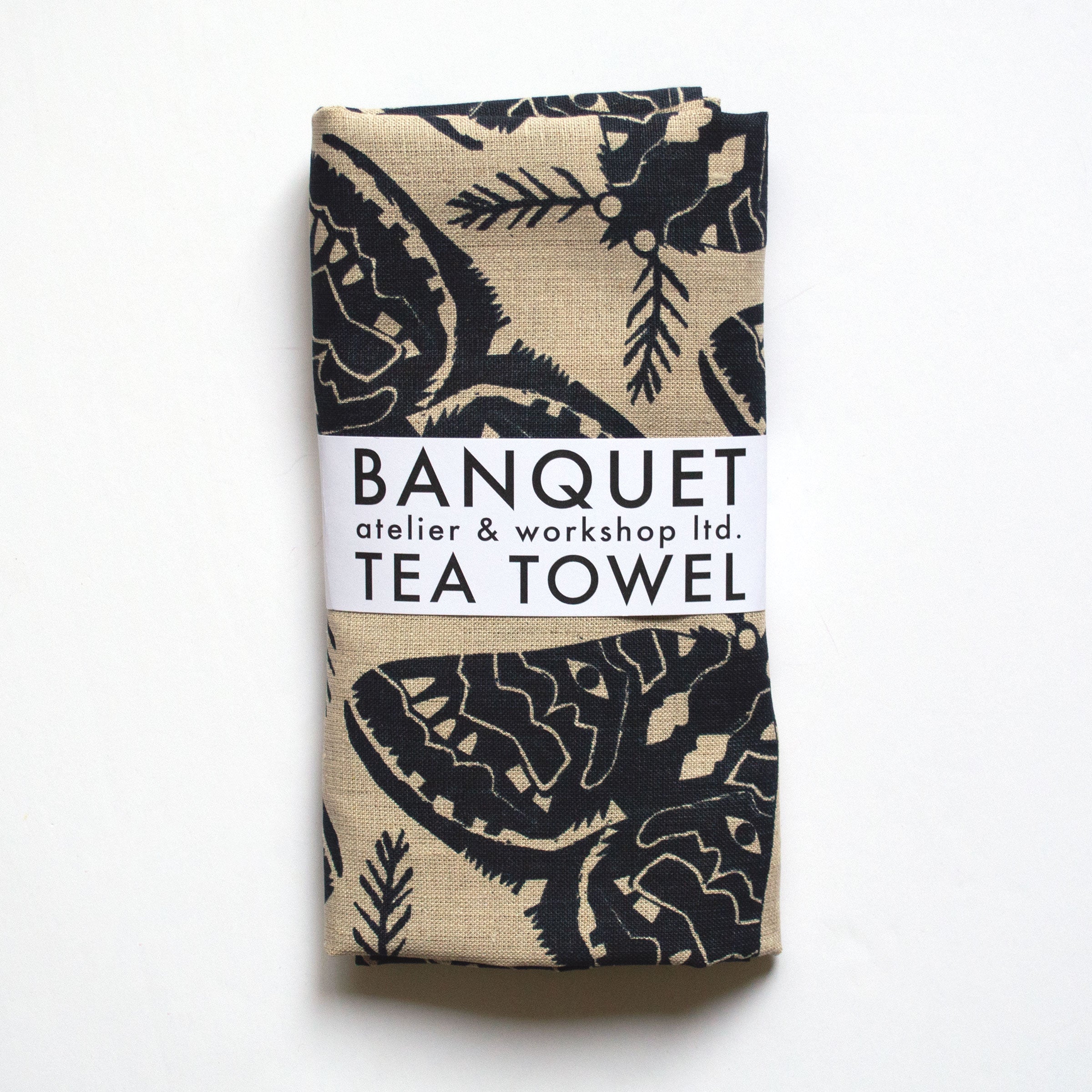 black on natural moth printed tea towel