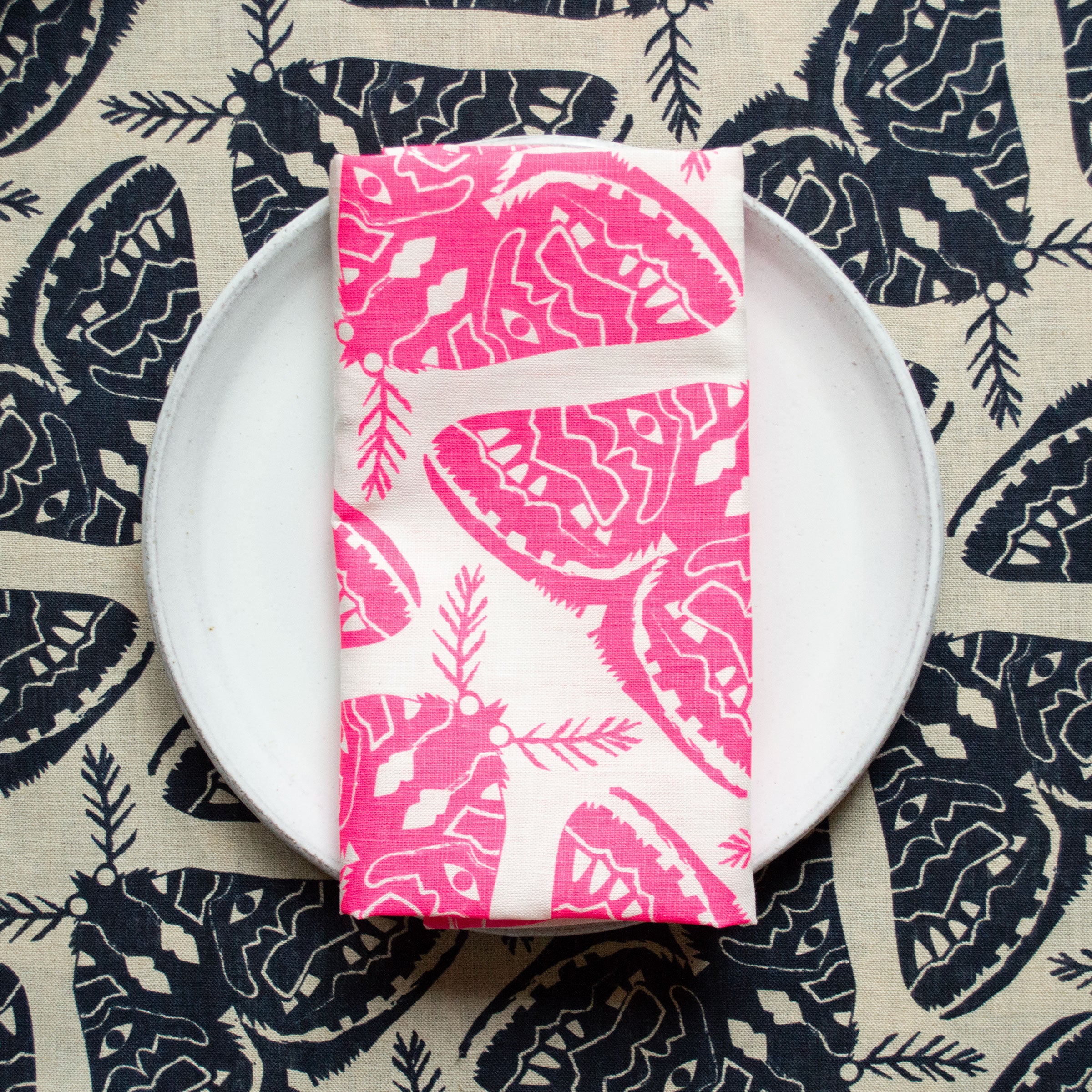 A Pair of Moths Linen Napkins in Neon Pink