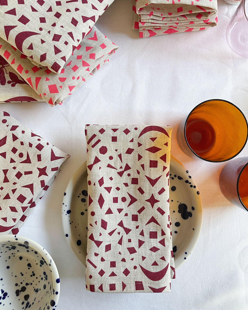 Snowflakes Tea Towel in Carmine on Natural