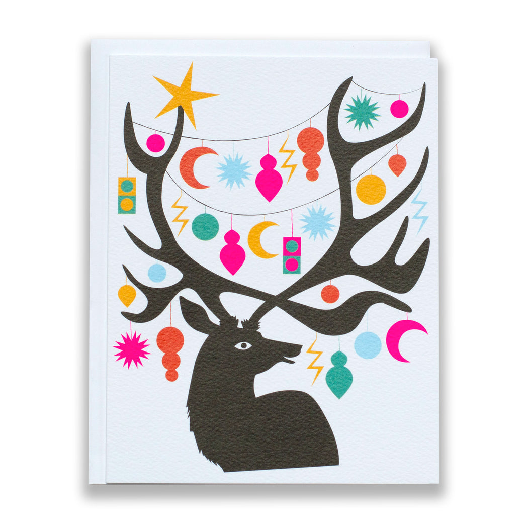 deer with large antlers filled with ornaments in all shapes and colours