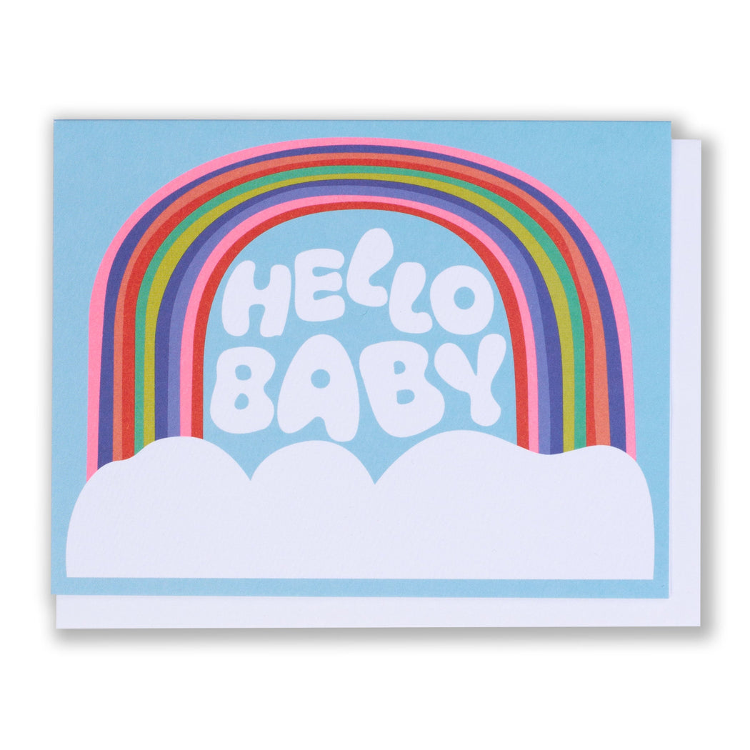 A baby card with a rainbow arching over letter-shaped clouds spelling out the greeting Hello Baby